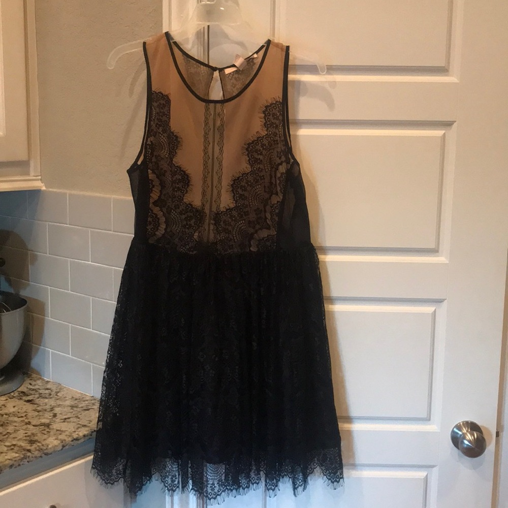 Nude and black lace mini dress